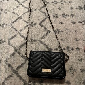 Black bebe purse with gold chain